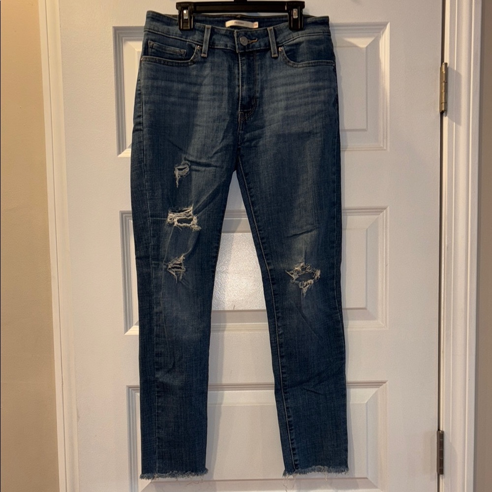 Women's Distressed Blue Jeans